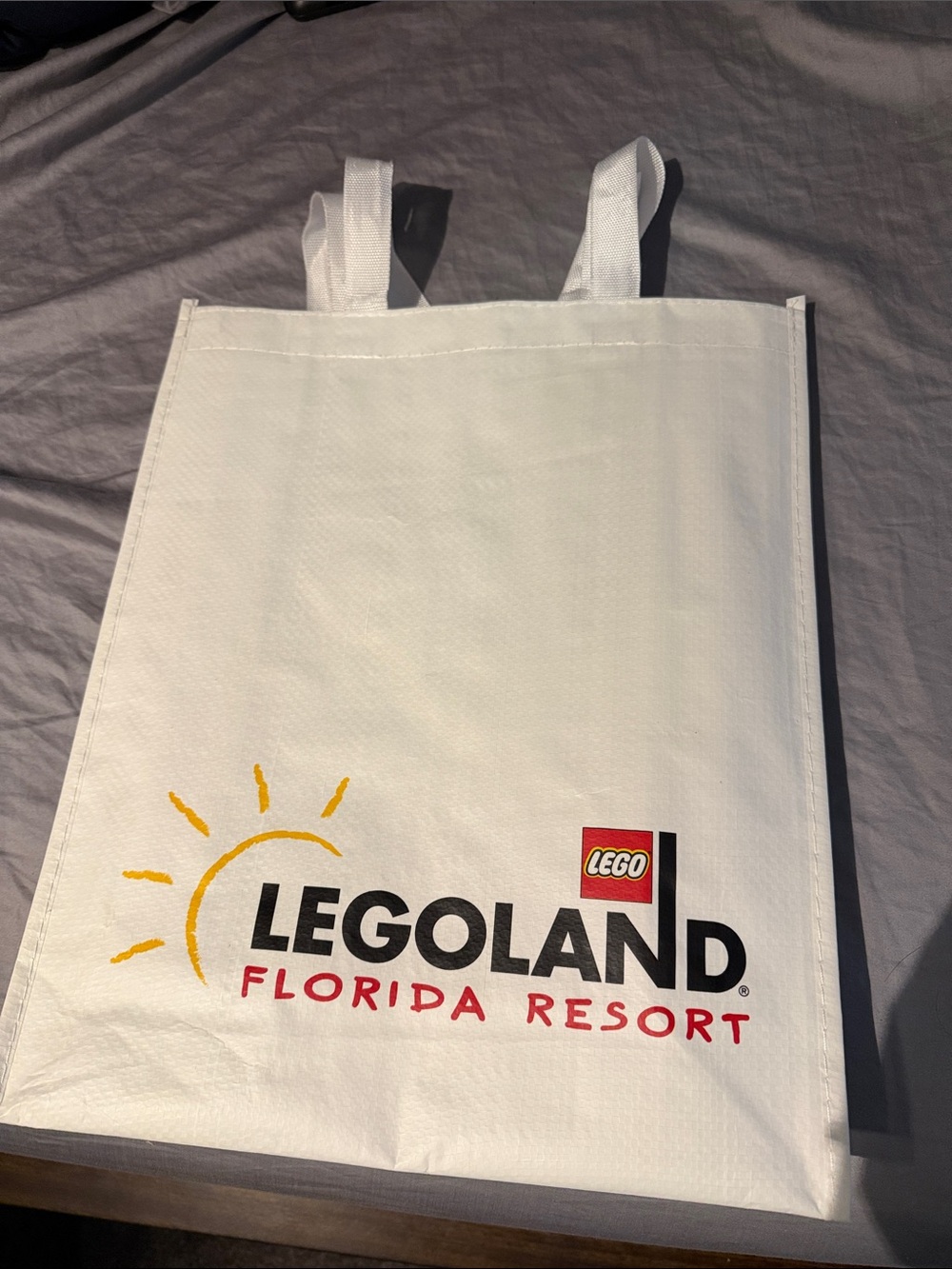 Lego White Tote Bag with Yellow Sun and Black & Red Logo